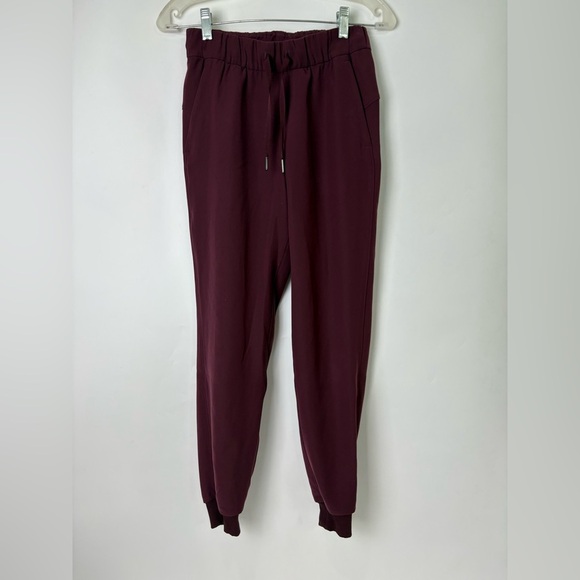 Lululemon On The Fly Jogger Woven Cassis Pant Maroon - Picture 4 of 8